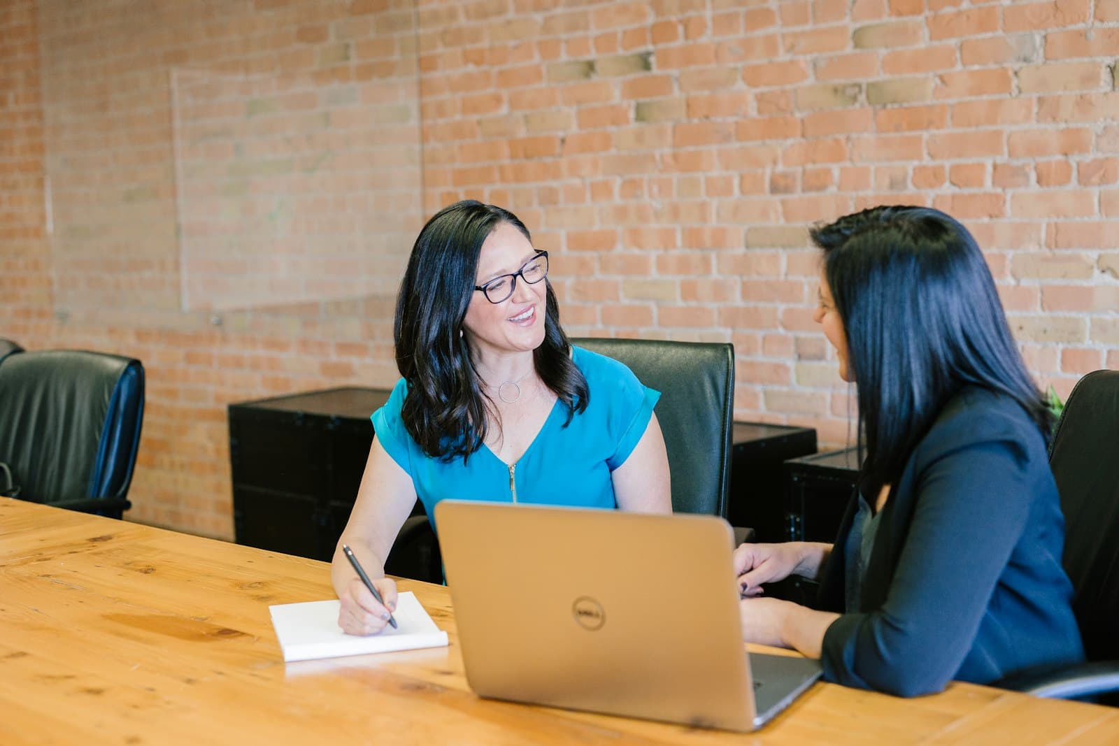 Professional at a laptop for accounts receivable recovery
