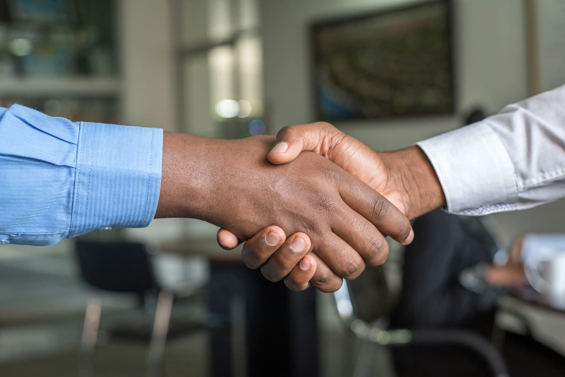 Handshake representing enrollment partnership continuity