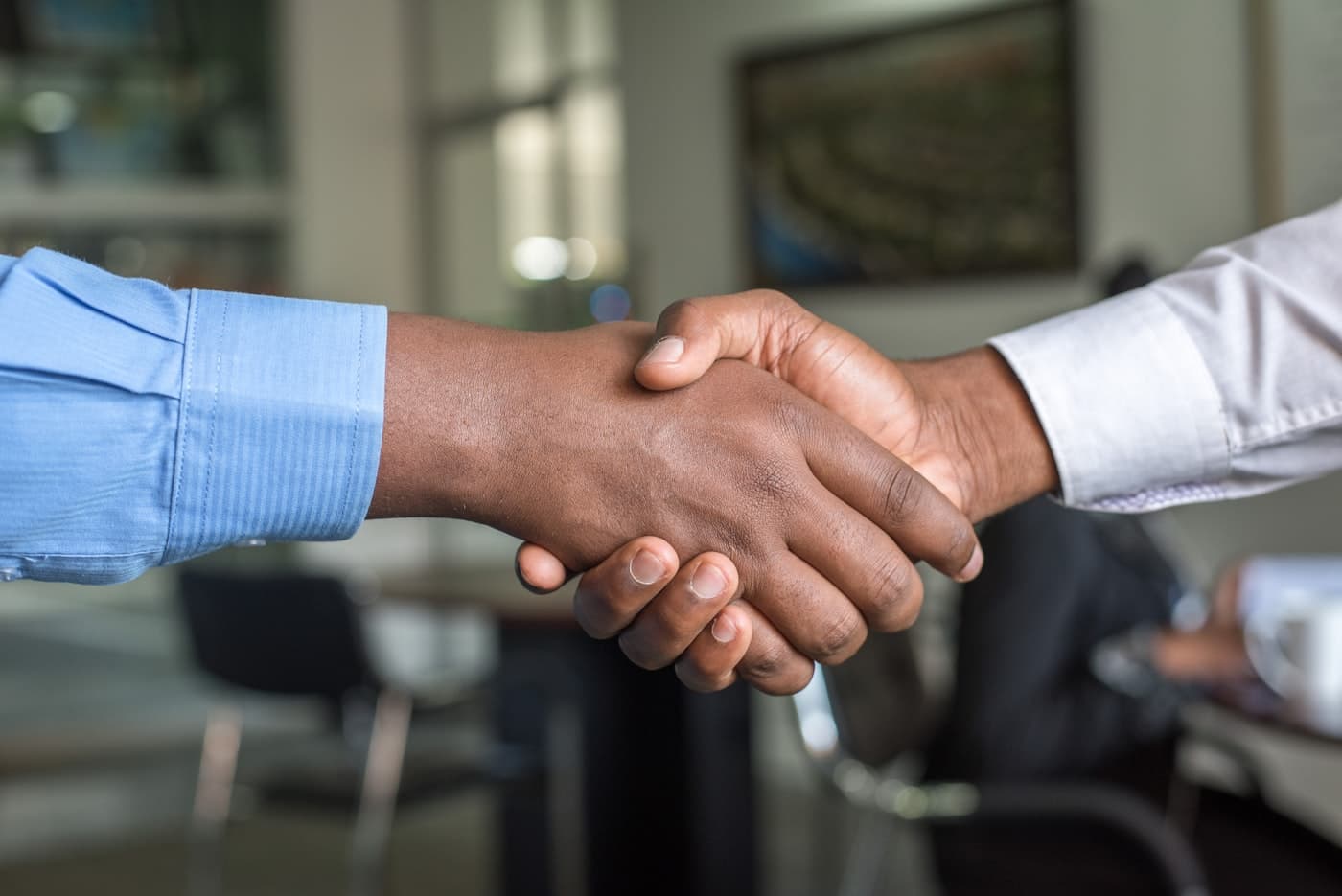 Handshake closing an enrollment or contracting discussion